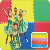 Colorful interlocking sports flooring mat featuring children in vibrant costumes dancing on the mats